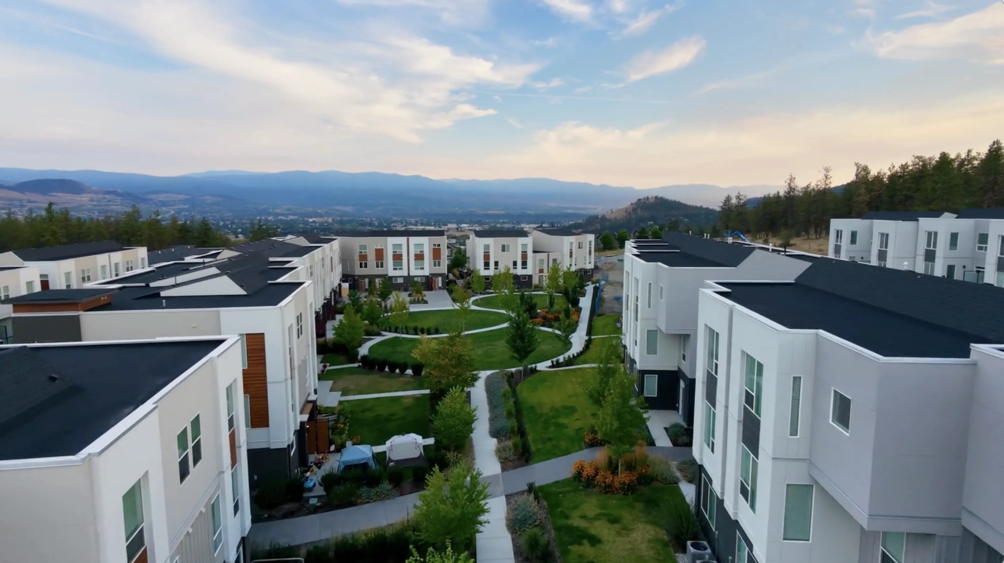 Aerial view over the Academy Ridge courtyard toward the Okanagan Valley