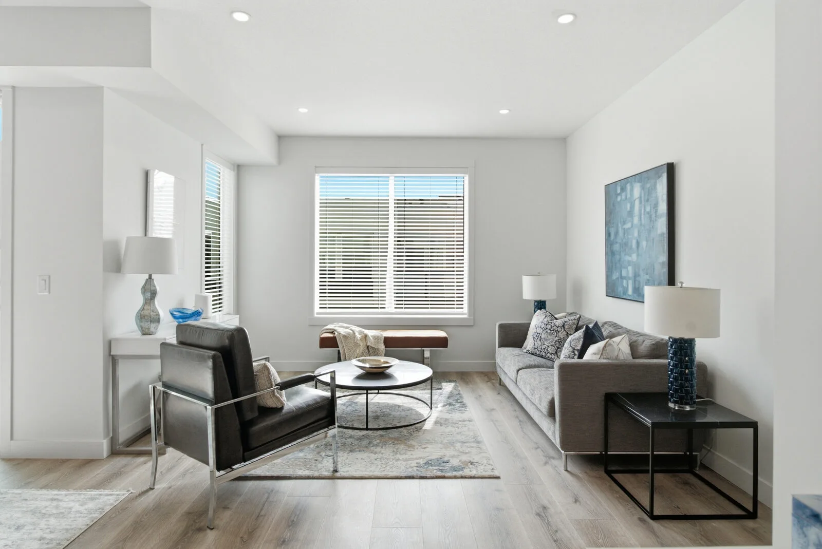 9-foot ceilings and designer finishes in an Academy Ridge living room